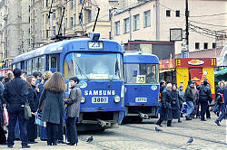 Commuters lining up for a No.23 tram near Sokol metro stration